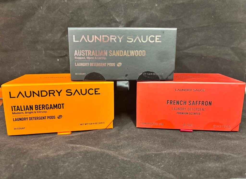 Laundry Sauce detergent pods in three scent boxes